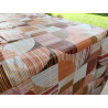 Rectangular tablecloth in water-repellent plastic. MULTICOLOR GEOMETRIC design.. In all sizes.. MADE IN ITALY..