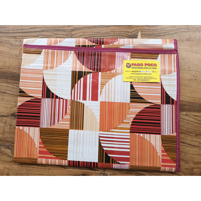 Rectangular tablecloth in water-repellent plastic. MULTICOLOR GEOMETRIC design.. In all sizes.. MADE IN ITALY..